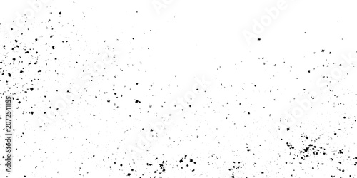 Black particles splattered on white grunge background vector illustration for creative design projects and artistic overlays