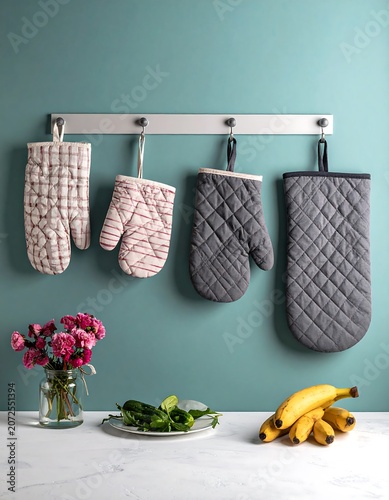 Kitchen oven mitts and cooking ingredients display
