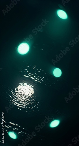 Emerald Glows: Aquatic Dance of Light