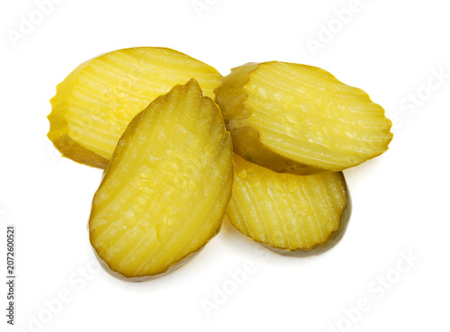 Fresh sliced green pickles isolated over white 