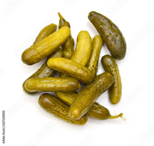 Fresh sliced green pickles isolated over white 