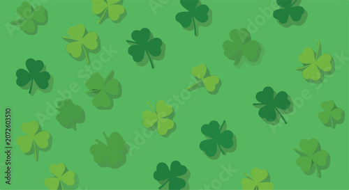 Fotografía A pattern of green shamrocks on green background