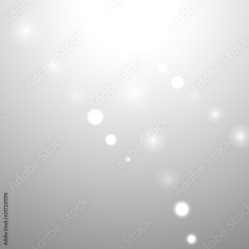 Silver Bokeh Christmas Background. Snow Flakes on Light Grey. Blurred Vector Design. Holiday Winter Backdrop With Glow and Overlay Effect. Season Bling Christmas Decoration.