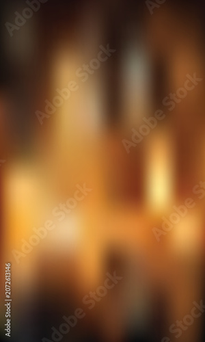 Warm, cozy interior with soft golden light and blurred inviting and intimate atmosphere