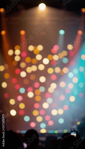 Concert Stage Lighting Vibrant Colors and Audience Silhouettes