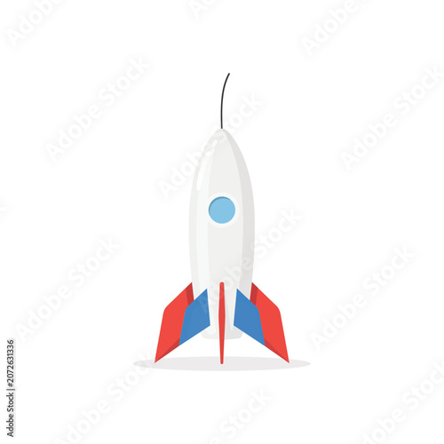 Photos White toy rocket with red and blue fins and a blue porthole isolated on a white