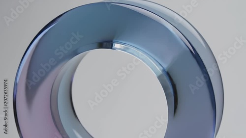 Abstract Blue Glass Sculpture Rotating on a White Background.