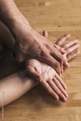 Bild auf Leinwand A man holds a woman's hands. Love, sex, relationships, psychology