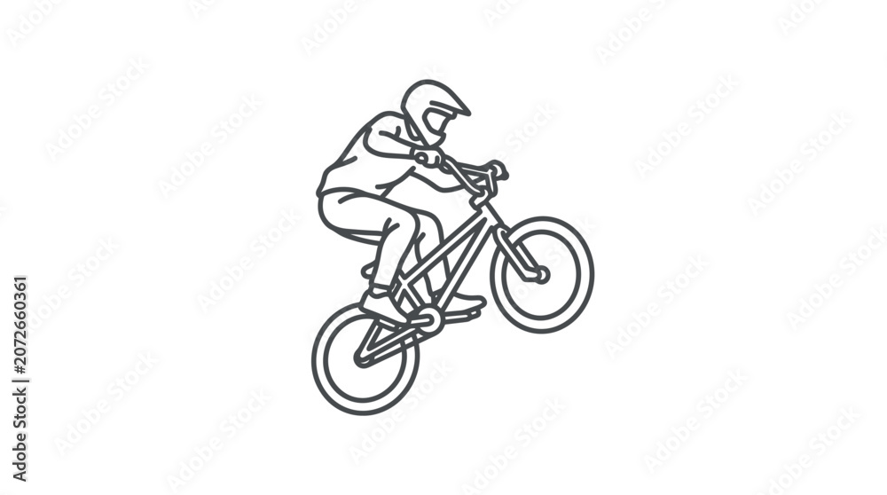 Fototapeta premium Mountain bike rider performing a wheelie stunt.