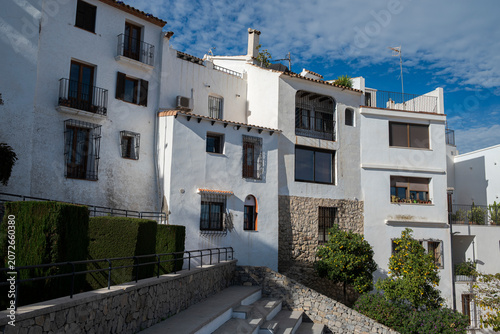 White Mediterranean houses with traditional architecture in the old town of Altea, Alicante, Spain.