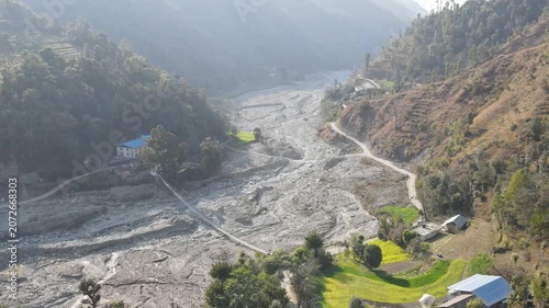 Flooded Village Along River  Aerial View of Natural Disaster