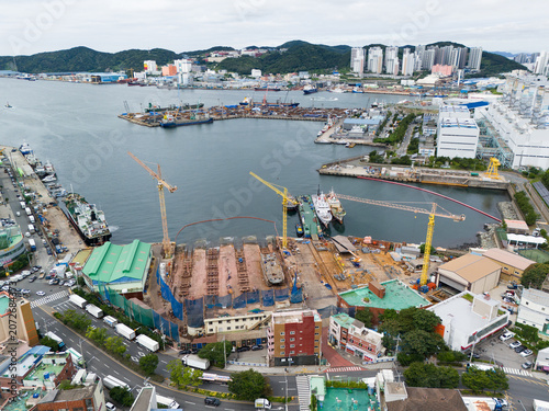 Obraz na plátně Drone footage of a shipyard and dry dock construction site in Busan South Korea