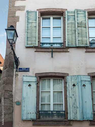 Colourful wooden shutters on a house in the old town of Colmar, Alsace, France.