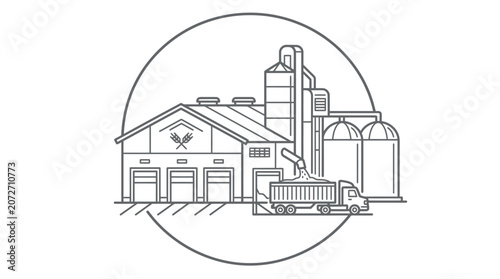 Industrial grain elevator facility with storage silos and truck.