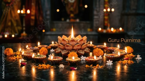 Beautiful arrangement of multiple burning clay diya lamps with flower decorations in traditional temple setting for guru purnima celebration