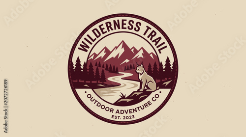 Circular emblem with a majestic mountain range, a winding river, lush pine forest, and a watchful wildcat, embodying the spirit of outdoor exploration and adventure