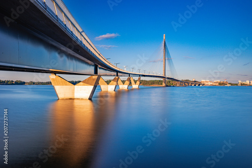 Modern Cable-Stayed Kruunuvuorensilta Bridge at Golden Hour, Helsinki