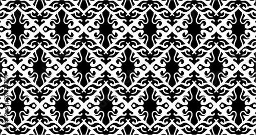 Intricate black and white seamless arabesque pattern with ornamental scrollwork. Repeating vector background for wallpaper, textiles, packaging, and decorative surfaces.