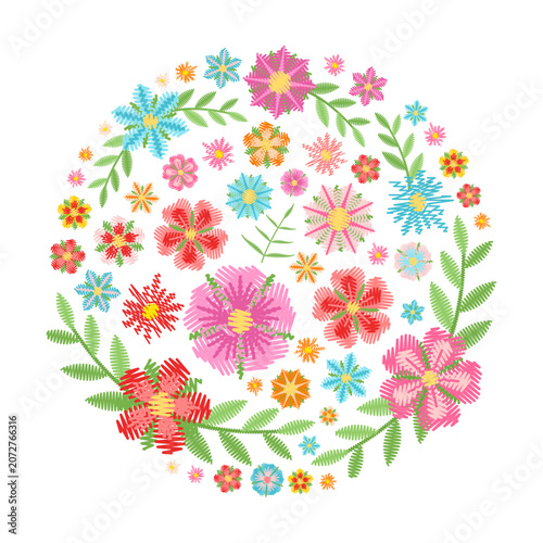 Round composition with bright embroidery flowers and leaves on white background. Fashion vector image.
