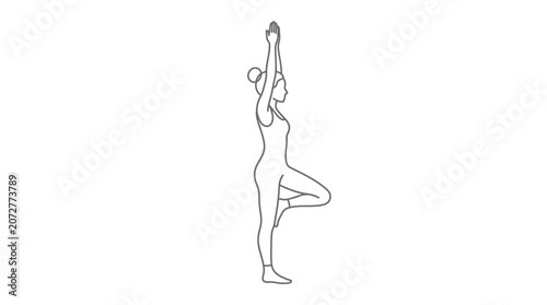 Foto Woman in yoga tree pose standing.