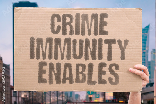 Fotografia "Crime immunity enables" Legal exemption allows misconduct