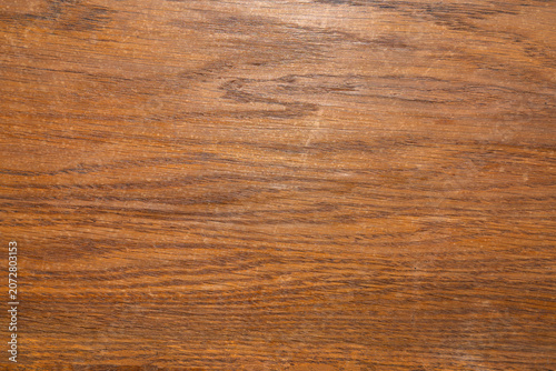 Dark texture of natural walnut wood.Wooden countertop antique furniture.Materials for finishing expensive grades.