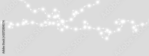 Tableau sur toile Festive Christmas border with conifer branches and warm lights