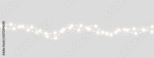 Fotografía Warm festive garland lights decorate transparent winter background