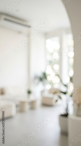 Minimalist Blurred Modern White Room Interior with Natural Light for Clean Background Concept