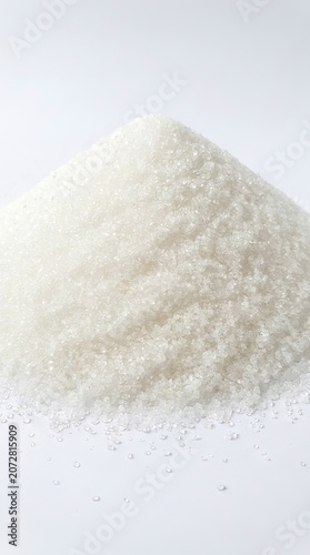 Pure White Granulated Sugar Pile Isolated on White Background for Food and Ingredient Concept