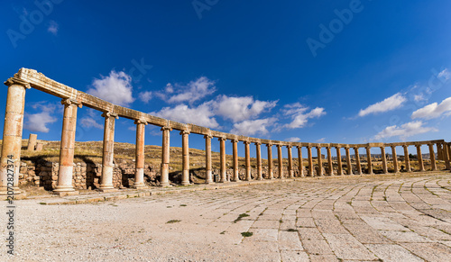 The Oval Plaza, one of the most recognizable landmarks of the ancient Roman city of Jerash in Jordan. The unique elliptical forum is surrounded by an impressive colonnade