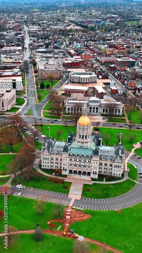 Vast cityscape of Hartford, Connecticut, the USA. Drone approaching the building of Connecticut State Capitol. Vertical video