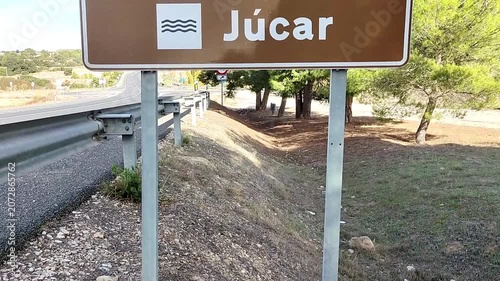 Jucar river brown road sign rural landscape Spain