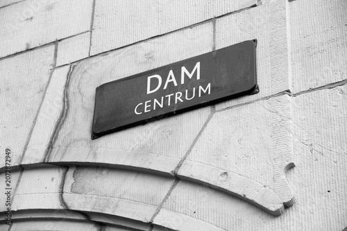 Dam, Amsterdam. Black and white photo.