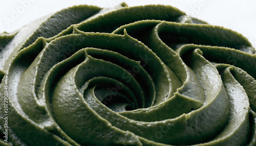 Green Frosting Swirl – Smooth Decorative Rosette with Creamy Texture and Artistic Dessert Photography Concept