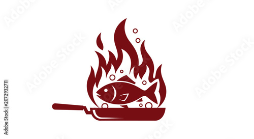 Fish in a frying pan over high flames.