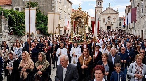 Traditional religious procession through a historic european town