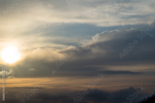 Cloudscape, Colored Clouds at Sunset near the Ocean as a Background