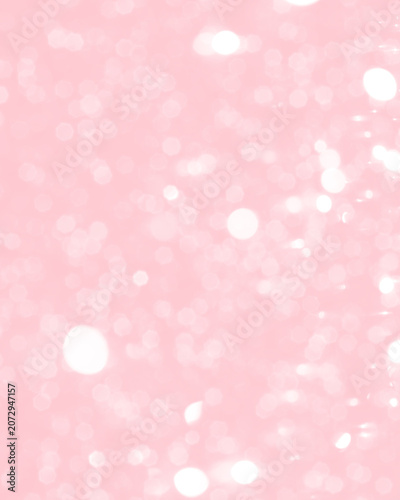 Soft pink bokeh background with blurred light sparkles, abstract festive celebration backdrop
