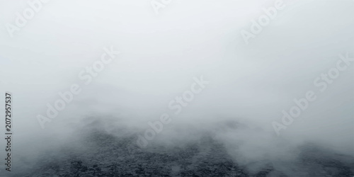 Fotografía Stormy Ocean Fog and Drifting Smoke Beneath Dark Clouds Over Misty Mountain Fore