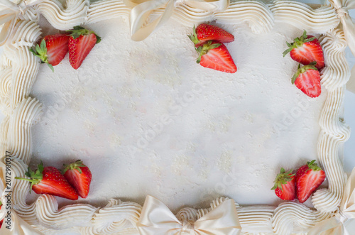 Top view, chocolate cake topped with buttercream and strawberry.Mock up.
