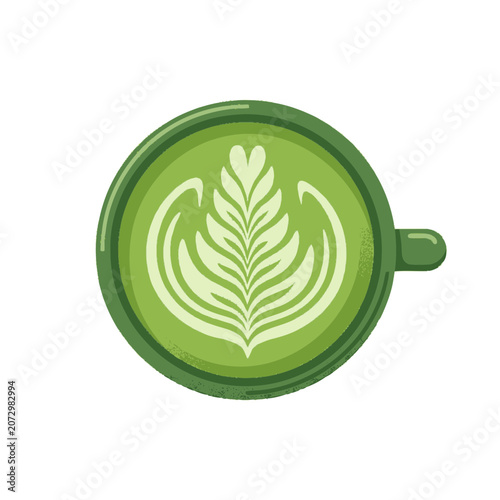 Top view of green matcha latte art with leaf design in a ceramic cup