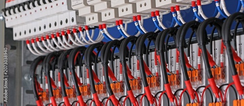 Connecting electrical modules using copper insulated electrical wires in the electrical switchboard. 
