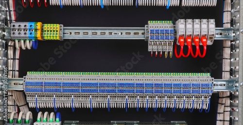 Connecting electrical modules using copper insulated electrical wires in the electrical switchboard. 
