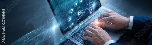Obraz na plátne Financial expert is diligently managing smart contracts using laptop for the DeFi network protocols to ensure absolute data integrity