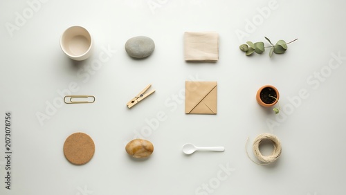 Minimalist Grid Arrangement of Natural and Household Objects on Neutral Background.
