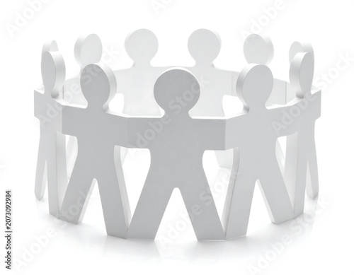 A circle of white paper cutout figures holding hands