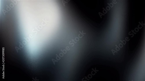 Full screen smooth animated gradient background slowly shifting from deep black and metallic silver to platinum and charcoal with soft flowing motion