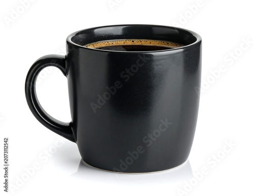 A black ceramic mug filled with coffee on a white background