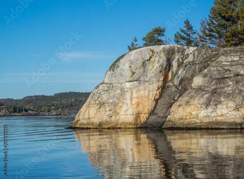 Nordic summer coast with calm sea, Scandinavian rocks, Minimalist landscape photography , blue water, peaceful atmosphere,nature, travel, tranquility, wellness, sustainability and Scandinavia